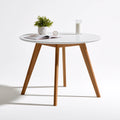 Table à manger aux lignes épurées, coloris blanc